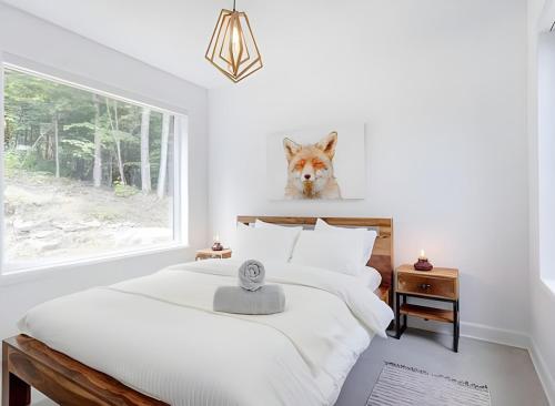 Ένα ή περισσότερα κρεβάτια σε δωμάτιο στο Modern Luxury Chalet Private Jacuzzi