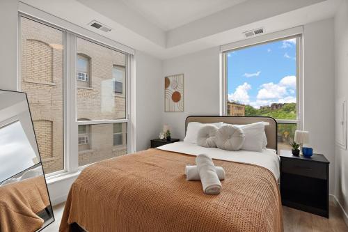 Ένα ή περισσότερα κρεβάτια σε δωμάτιο στο Chic & Luxury 1Bd Condo In Downtown Minneapolis, Minutes From Minneapolis Convention Center & US Bank Arena