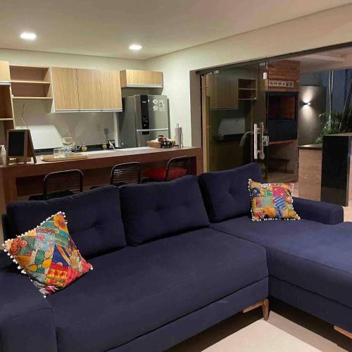 a blue couch with two pillows in a living room at Casa De Verano De 2 Habitaciones - Mima Roga 3 in San Bernardino