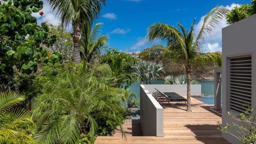 a view of the pool from the deck of a house at Marigot Bay Oasis with Infinity Pool in Marigot