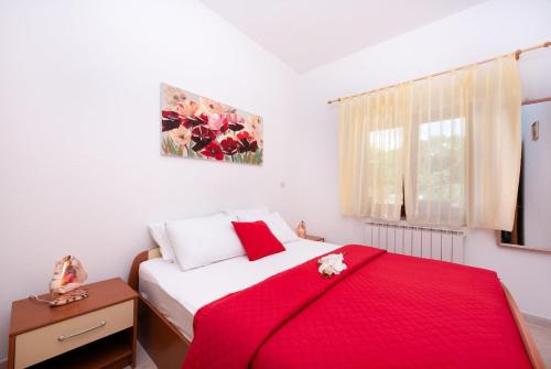 Postel nebo postele na pokoji v ubytování Apartman Roko