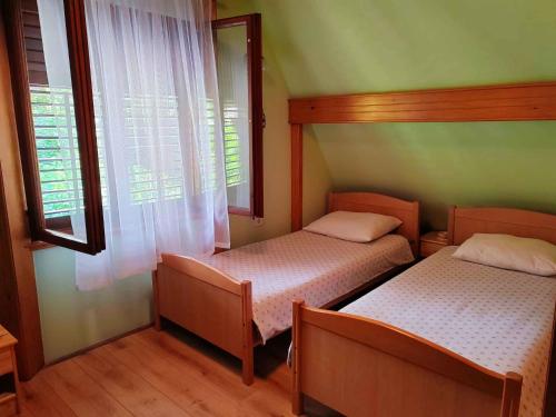 Postel nebo postele na pokoji v ubytování Holiday home in Turke - Gorski Kotar 34884