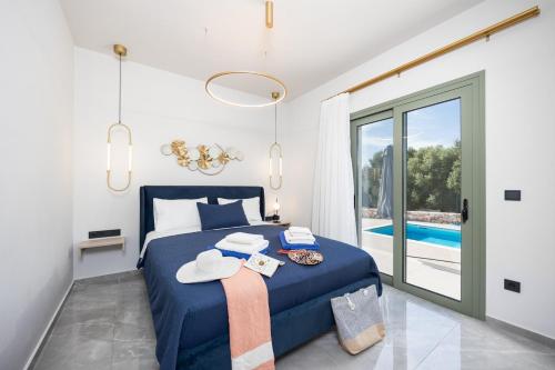 Ένα ή περισσότερα κρεβάτια σε δωμάτιο στο Villa Tania Ena