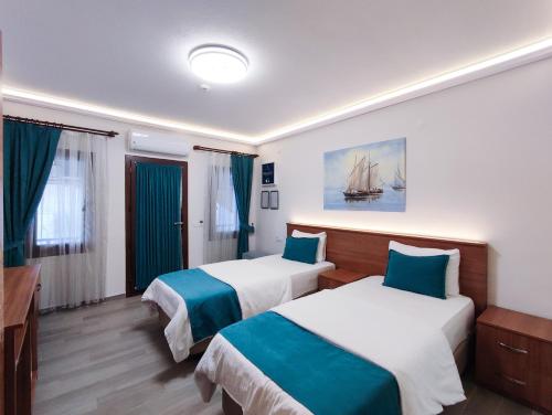 Katil atau katil-katil dalam bilik di İskelem Otel
