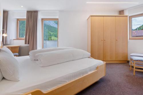 Postel nebo postele na pokoji v ubytování Haus Lena