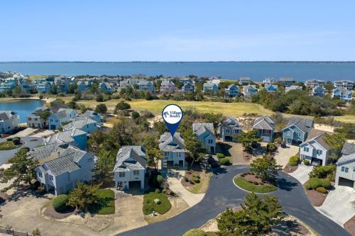 an aerial view of homes with a hot air balloon at Always Chill in Nags Head