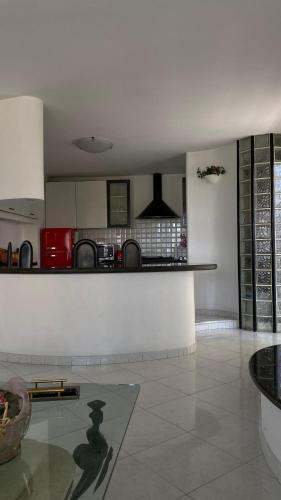 a kitchen with a counter and a counter top at B&B Villa Pina in Colleferro