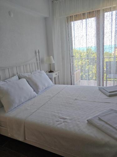 Postel nebo postele na pokoji v ubytování Kybele Resort Kybele Evi