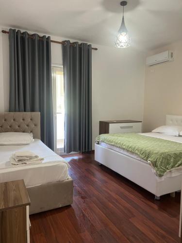 Katil atau katil-katil dalam bilik di Elly Apartment 2