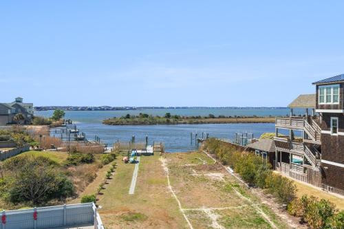 arial view of a river with houses and buildings at Bela Vista in Nags Head