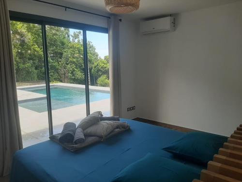 Katil atau katil-katil dalam bilik di Villa 4 étoiles Bon Air