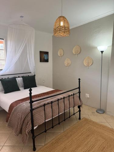 En eller flere senge i et værelse på Cadle Craft Cottage