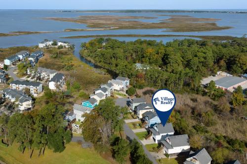 an aerial view of a village with a hot air balloon at Aqua Adventure in Kill Devil Hills