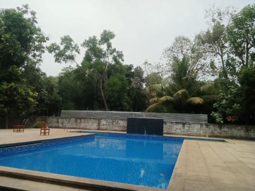 Πισίνα στο ή κοντά στο Chendura Home Stay