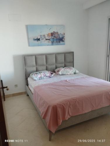 Postel nebo postele na pokoji v ubytování Résidence soltana Bizerte Vue sur mer