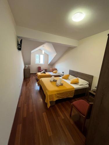 Katil atau katil-katil dalam bilik di Boutique Hotel Tomić