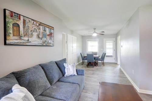 a living room with a couch and a table at 5 Mi to Zoo Family Retreat in Wichita! in Wichita