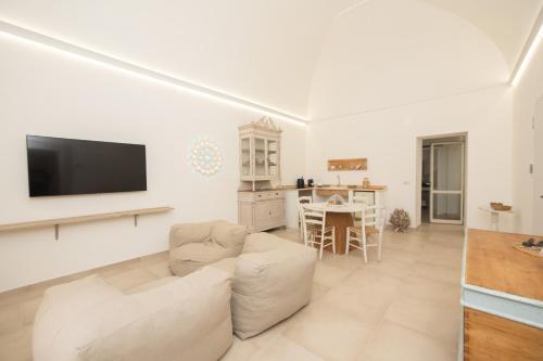 TV/trung tâm giải trí tại Porto Antico Luxury Rooms