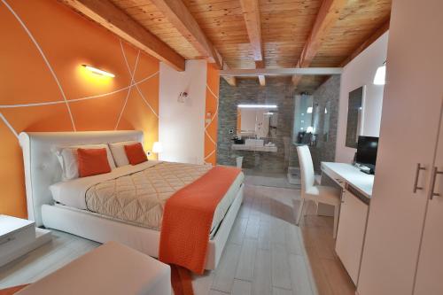 Posteľ alebo postele v izbe v ubytovaní Villa Giulia Del Cavaliere