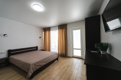 Фотография из галереи Міні-готель TURIN з басейном на Кароліно-Бугазі в Каролино-Бугазе