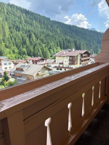 a balcony with a view of a town at Hotel Elisabeth in Gerlos