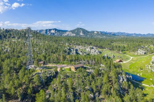 an aerial view of a resort in the mountains at Panorama Peak Mountain Hideaway in Custer