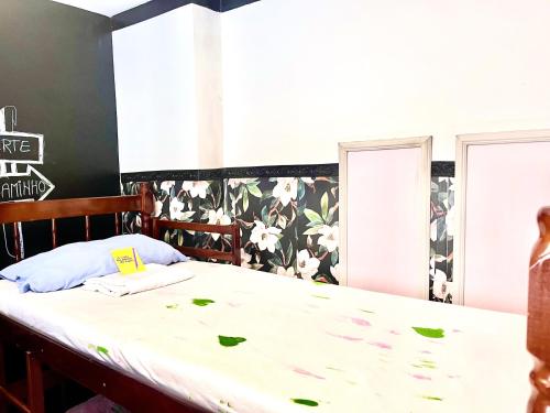 Postel nebo postele na pokoji v ubytování Toca da Mona Roots Hostel