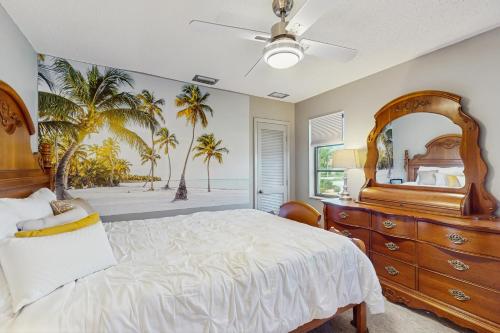 Postel nebo postele na pokoji v ubytování Blue Dolphin