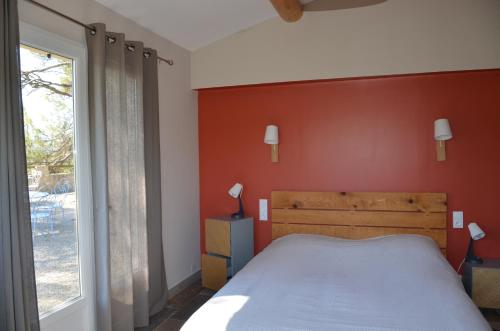 Llit o llits en una habitació de Mas Carlette
