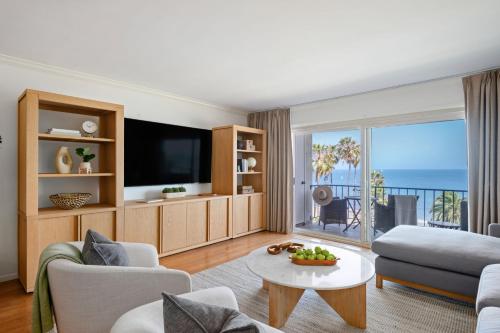 Et tv og/eller underholdning på SeaCliff - Shoreline by Paradise Retreats