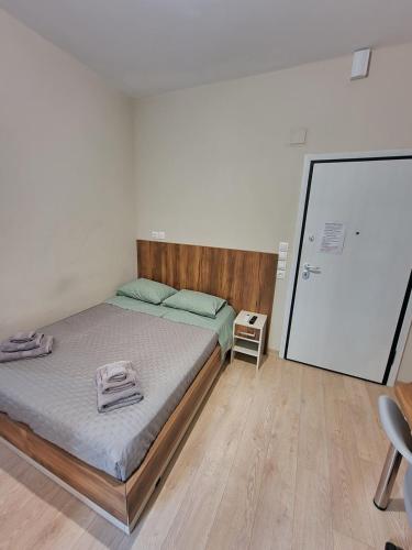 Postel nebo postele na pokoji v ubytování Diana's Cozy 21 Studio