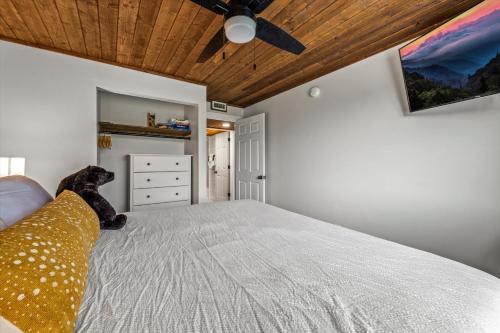 a bedroom with a large bed with a wooden ceiling at Sky View Mountain Dream in Gatlinburg