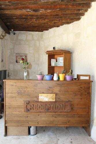 a wooden counter with plants on top of it at Zen Cappadocia House in Goreme