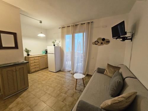 Televízia a/alebo spoločenská miestnosť v ubytovaní Corfu Dream Holidays Villas