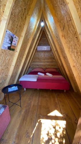 Una cama o camas en una habitación de The Hood - Shkodra Backpackers Hostel & Day Tours