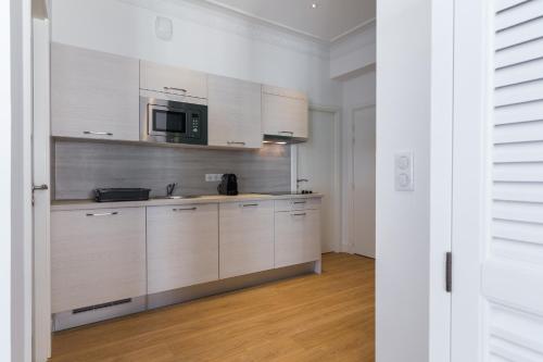 Η κουζίνα ή μικρή κουζίνα στο Florella Antibes Apartment