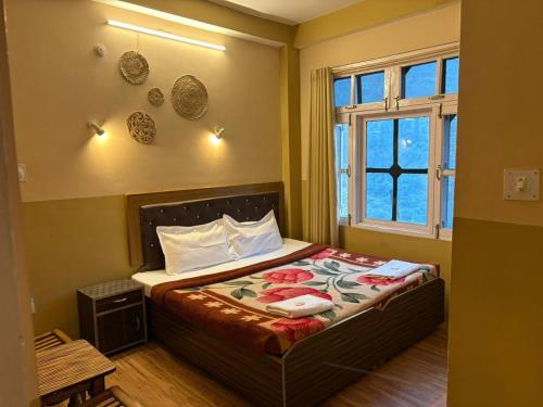 Ένα ή περισσότερα κρεβάτια σε δωμάτιο στο A Nature Resort