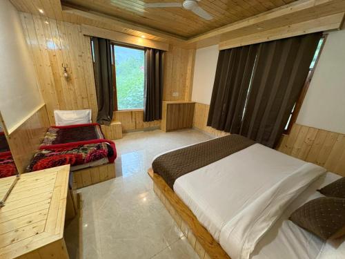 Ένα ή περισσότερα κρεβάτια σε δωμάτιο στο A Nature Resort