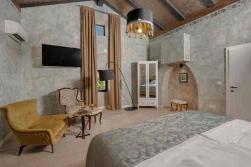 Ένα ή περισσότερα κρεβάτια σε δωμάτιο στο Marichi Residence