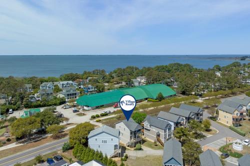 an aerial view of a town with houses and a building at Corolla & Lime in Corolla