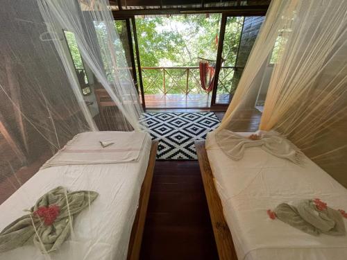 Letto o letti in una camera di Todo Bien Nicaragua
