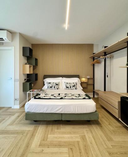 Letto o letti in una camera di Valcamonica Apartments