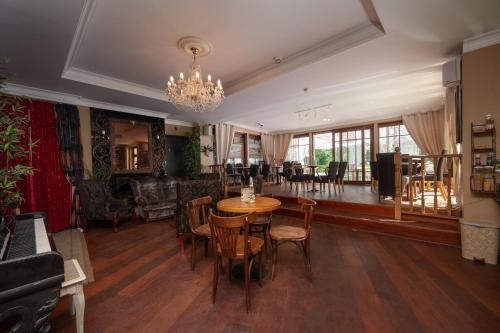 Posezení v ubytování Paivilla Boutique Hotel