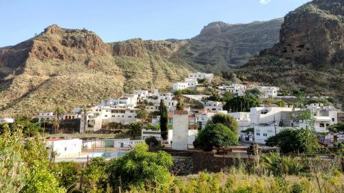 a view of a village in the mountains at Casa Tamadaba in Agaete