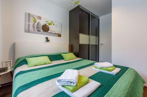 En eller flere senge i et værelse på Holiday home in Grizane 39291