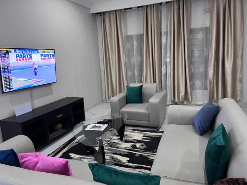 TV a/nebo společenská místnost v ubytování Muka Staytel