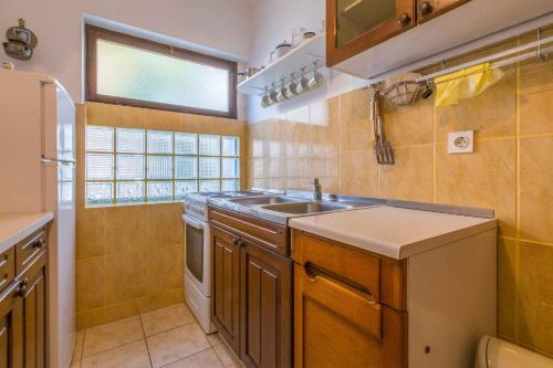 Kuchyň nebo kuchyňský kout v ubytování Apartments in Crikvenica 39341