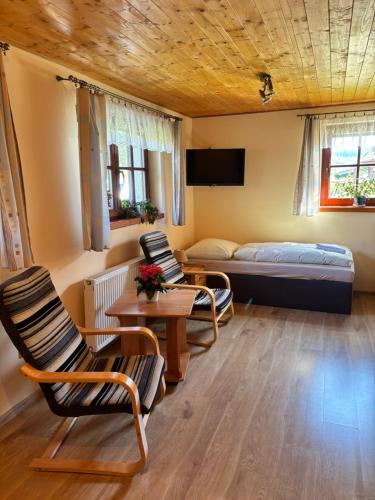 Postel nebo postele na pokoji v ubytování Apartmány Votočkovi