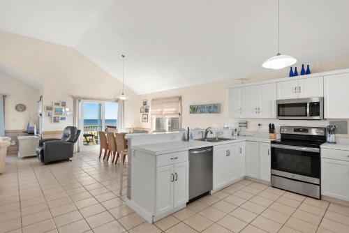 Kuchyň nebo kuchyňský kout v ubytování Ellington Cottage By The Sea