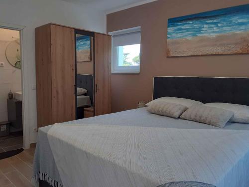 Postel nebo postele na pokoji v ubytování Apartment in Malinska - Insel Krk 42222